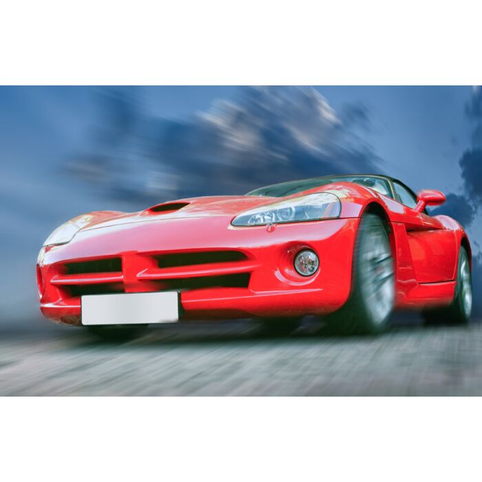 Red Sports Powerful Car On Stone Blocks Against Sky - ID # 39611494