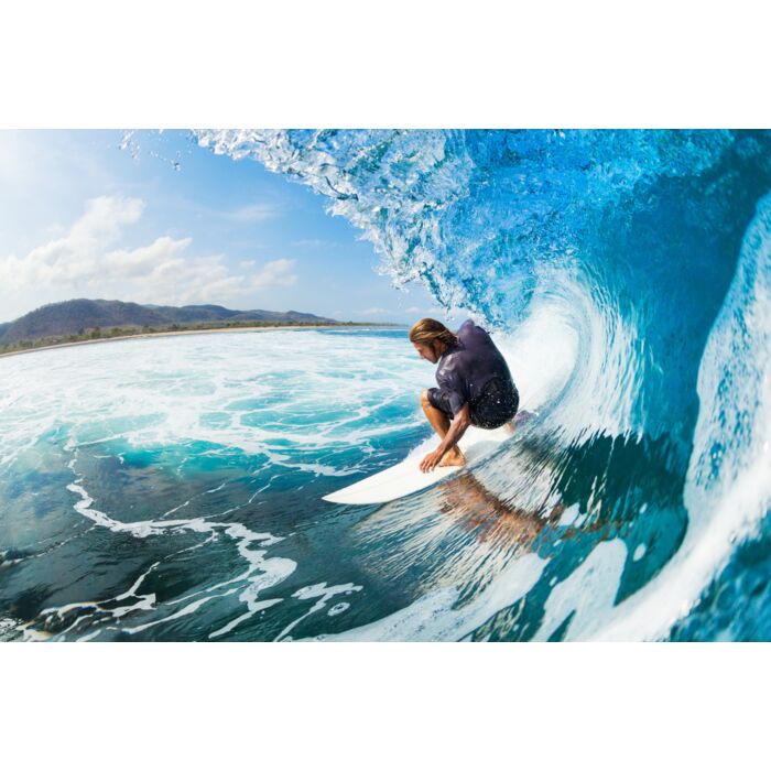 Surfer On Blue Ocean Wave In The Tube Getting Barreled - ID # 117660574