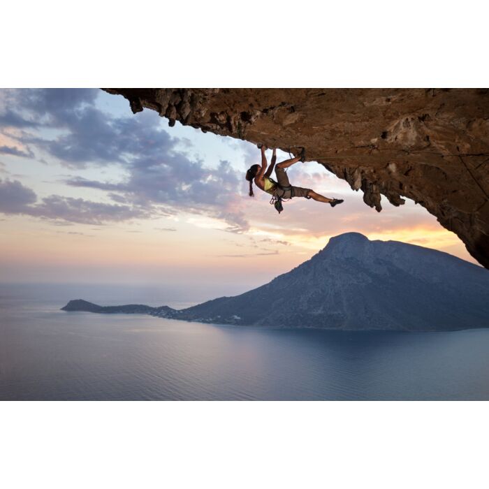 Young female rock climber at sunset Kalymnos Island Greece - ID # 171542741