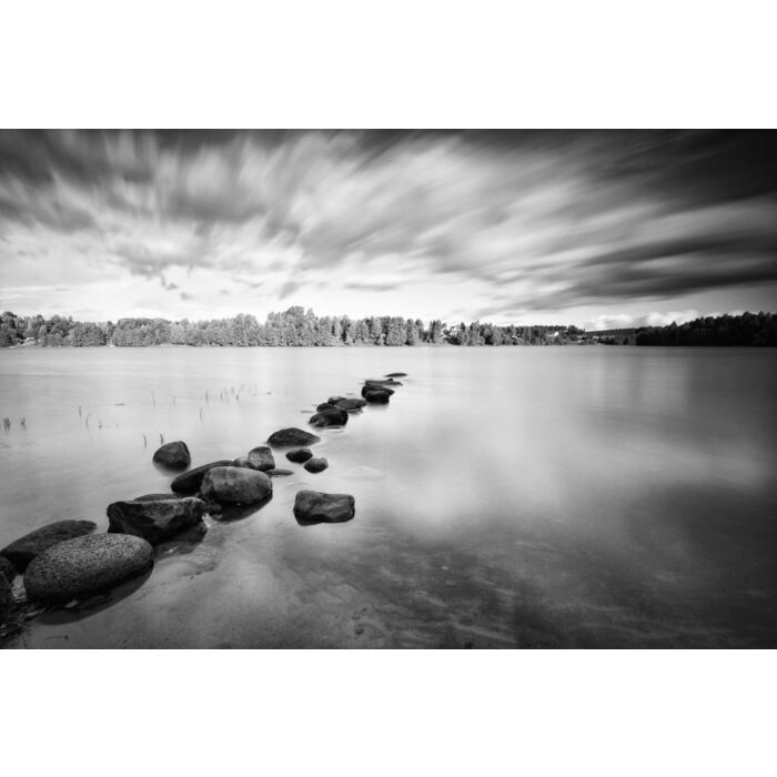 Moving clouds above a tranquil lake in black and white - ID # 38097589 Moving clouds above a tranquil lake in black and white - ID # 38097589