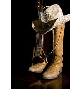 Spotlight on country music symbols cowboy boots acoustic guitar and hat - ID # 131286080