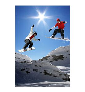 Snowboarders jumping against blue sky - ID # 64067500