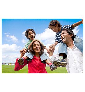 Happy Family Having Fun In Front Of Their House - ID # 14482771